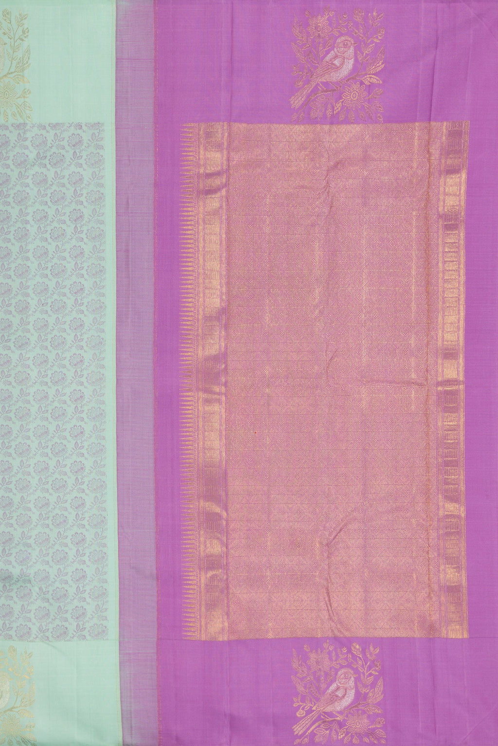 Close up image of the pallu of Light Blue Kanjivaram Silk Saree with Jacquard design on the body and Fancy Border. 