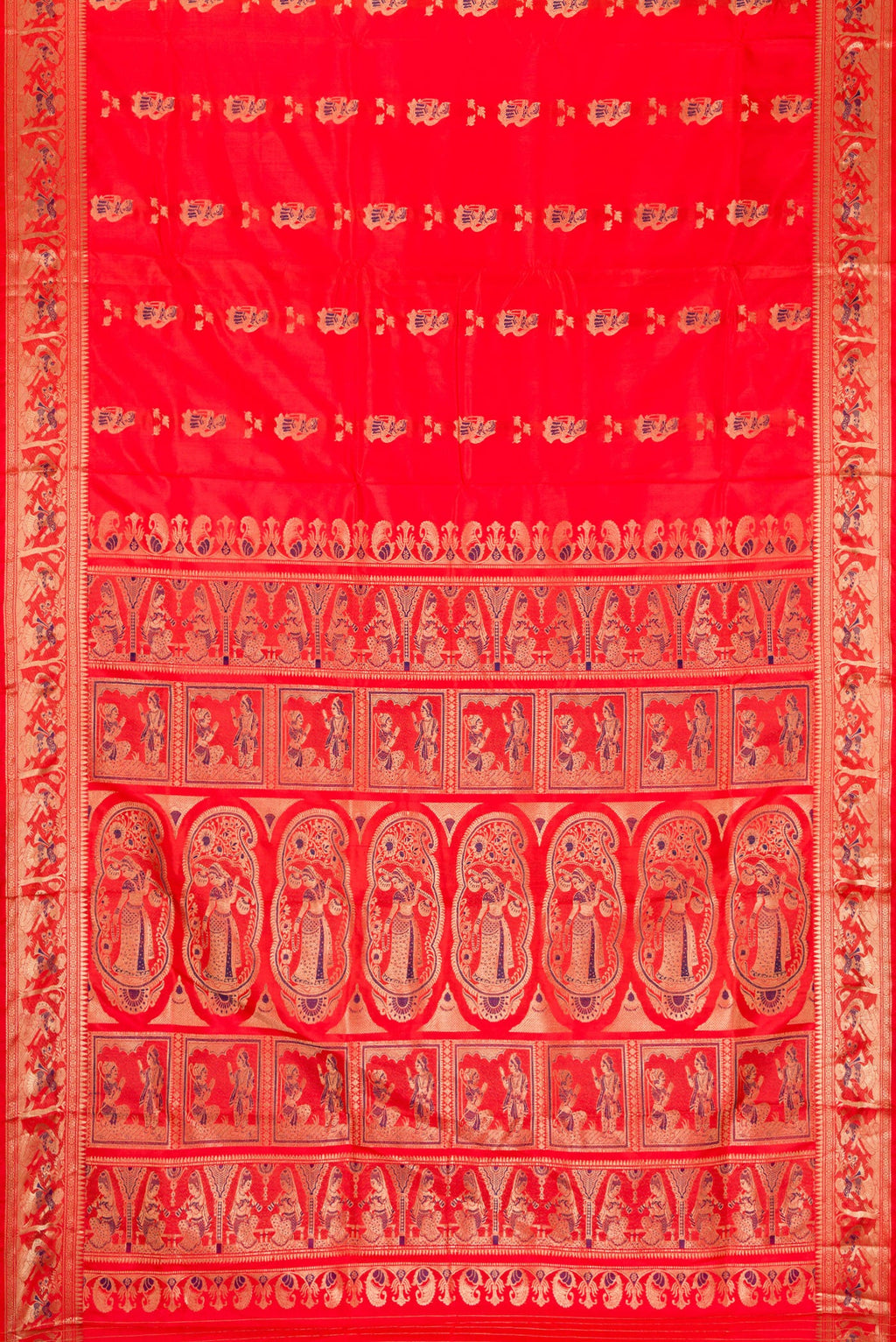 Flat view of Orange Baluchari Silk Saree with Zari And Thread Butta on the body and Fancy Border. 