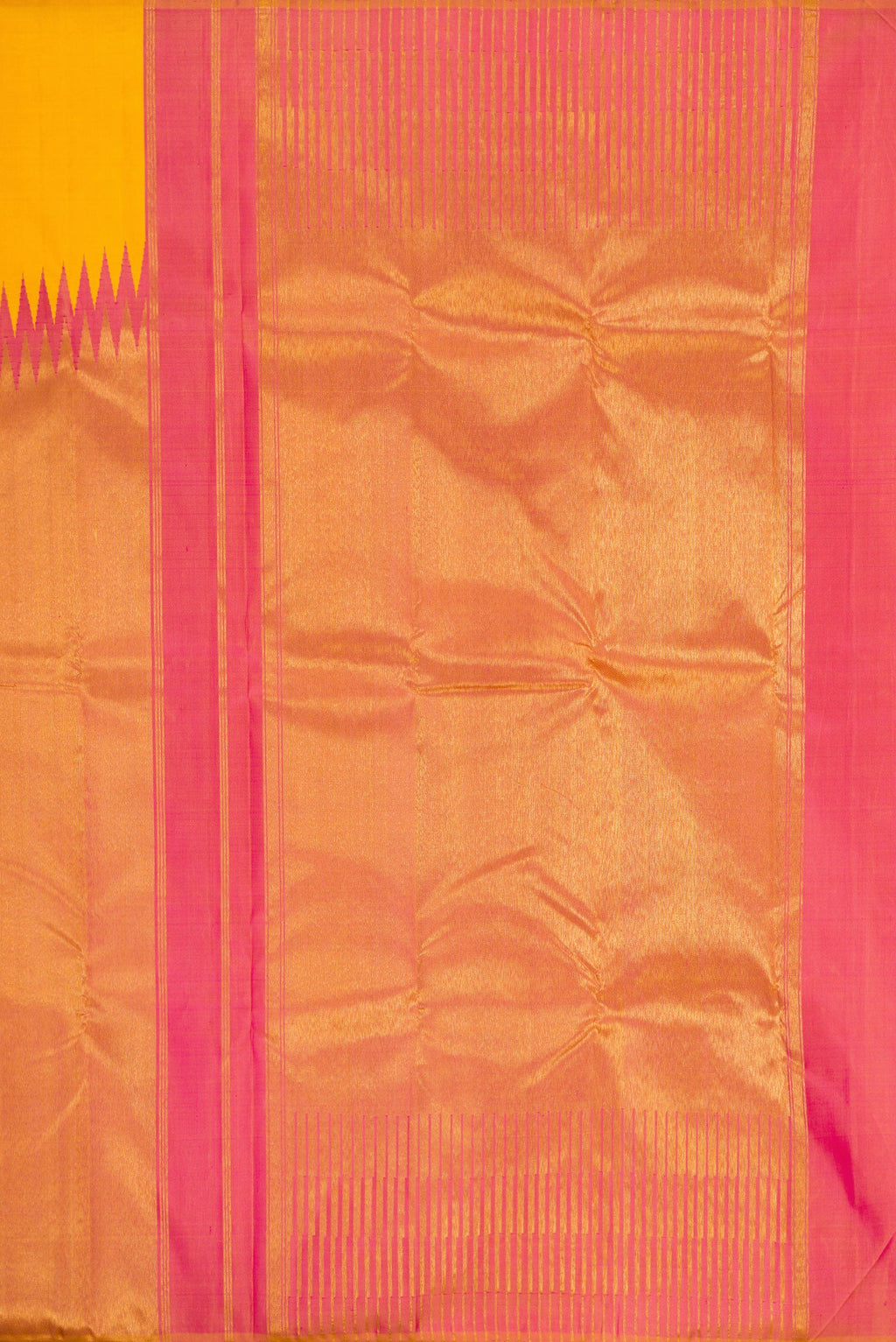 Close up image of the pallu of Yellow Kanjivaram Silk Saree with Plain Body and Rising Temple Border. 