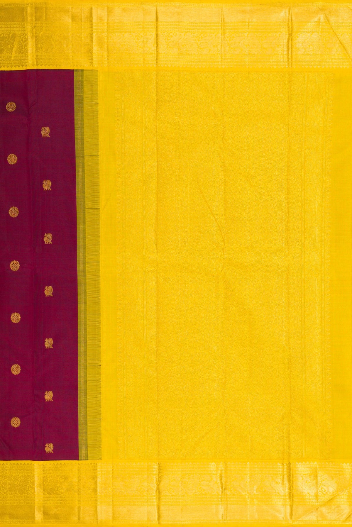 Close up image of the pallu of Maroon Kanjivaram Silk Saree with Zari Butta on the body and Zari Border. 