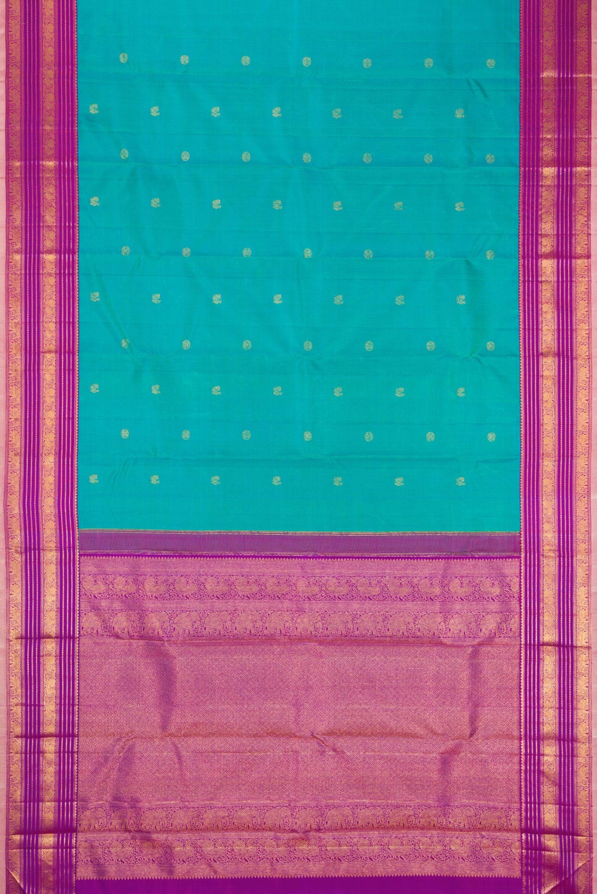 Flat view of Blue Kanjivaram Silk Saree with Zari Butta on the body and Zari Border. 