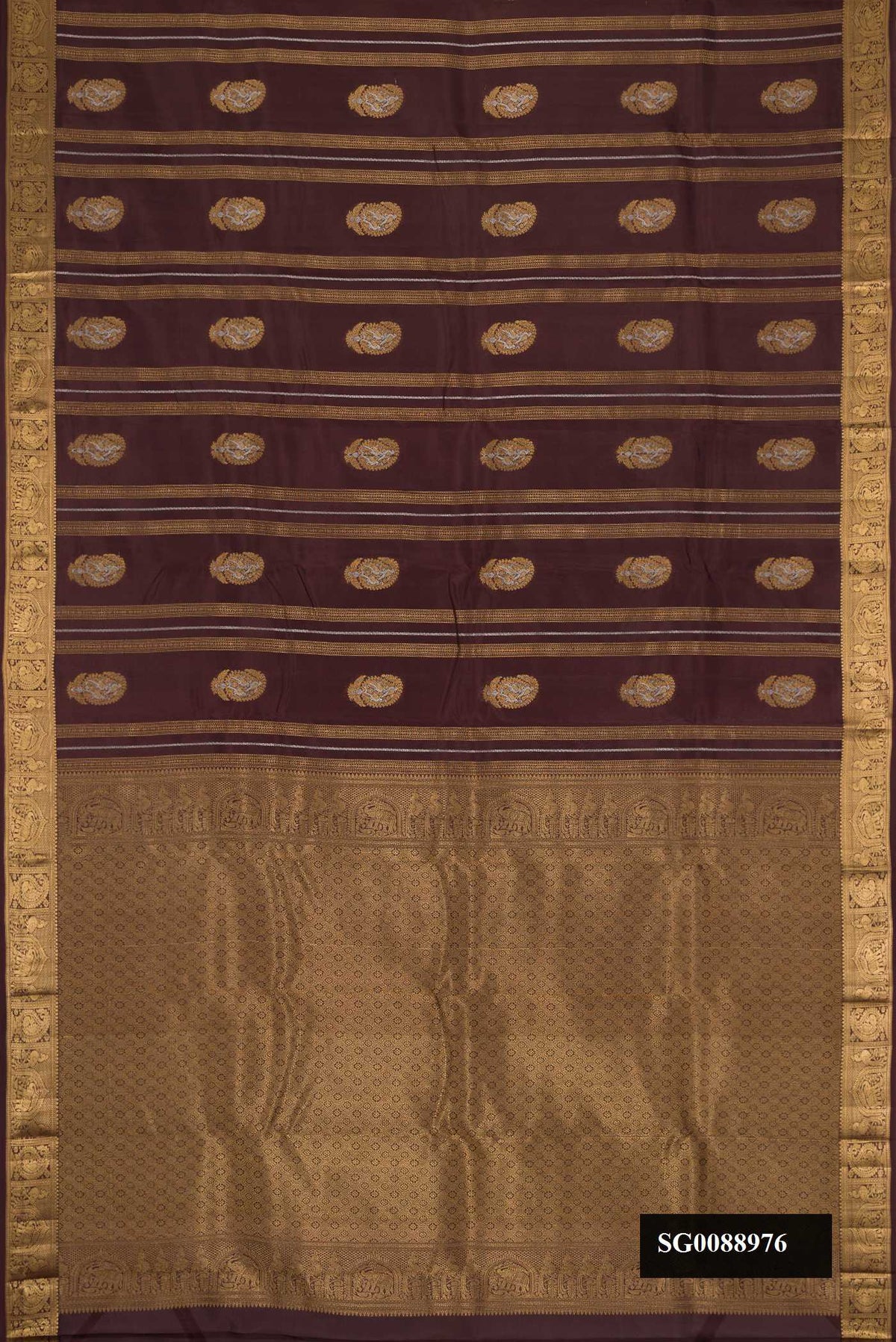 Coffee Brown Dual Tone Kanchipuram Silk Saree with Zari Butta on the body and Zari Border.  displayed on a mannequin