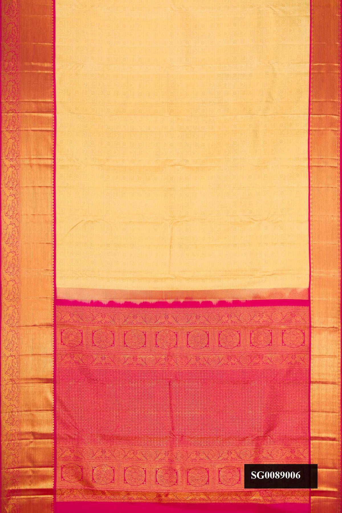 Gold Dual Tone Kanchipuram Silk Saree with Zari Brocade on the body and Zari Border.  displayed on a mannequin