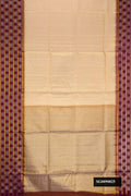 Gold Dual Tone Kanchipuram Tissue Silk Saree with Zari Brocade on the body and Fancy Border.  displayed on a mannequin