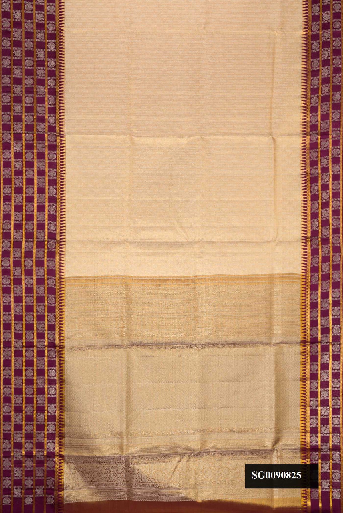 Gold Dual Tone Kanchipuram Tissue Silk Saree with Zari Brocade on the body and Fancy Border.  displayed on a mannequin