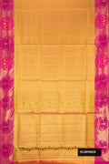 Gold Dual Tone Kanchipuram Tissue Silk Saree with Zari Brocade on the body and Fancy Border.  displayed on a mannequin