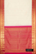 Sandal Dual Tone Kanchipuram Silk Saree with Zari Butta on the body and Zari Border.  displayed on a mannequin