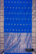 Royal Blue Dual Tone Kanchipuram Silk Saree with Zari Butta on the body and Zari Border.  displayed on a mannequin