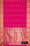 Dark Pink Dual Tone Kanchipuram Silk Saree with Zari Butta on the body and Zari Border.  displayed on a mannequin