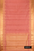 Rose Gold Dual Tone Kanchipuram Silk Saree with Zari Butta on the body and Zari Border.  displayed on a mannequin