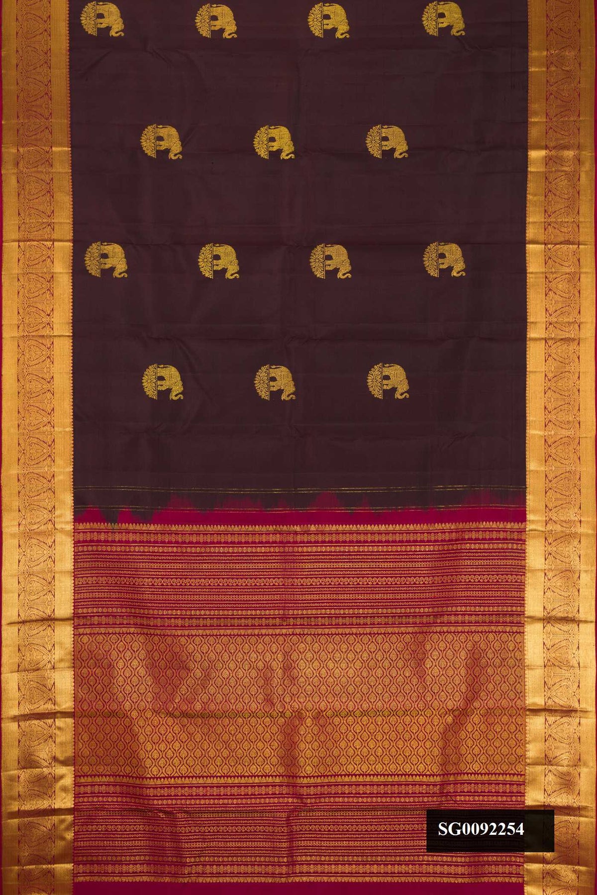 Coffee Brown Dual Tone Kanchipuram Silk Saree with Zari Butta on the body and Zari Border.  displayed on a mannequin