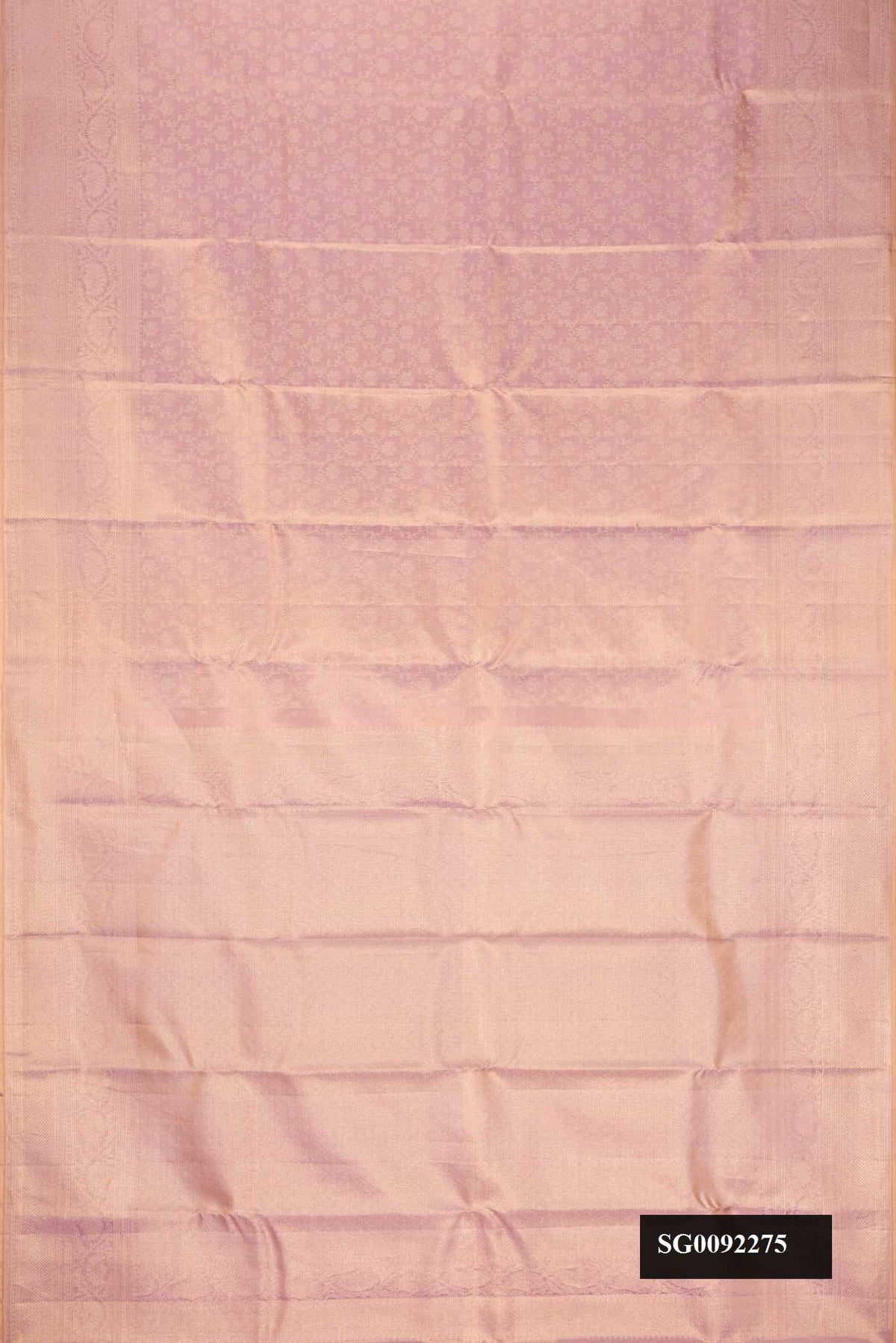 Rose pink Dual Tone Kanchipuram Tissue Silk Saree with Zari Brocade on the body and Zari Border.  displayed on a mannequin
