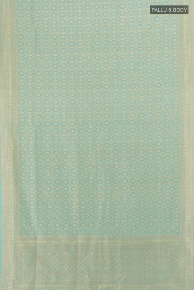 Pleats and pallu of Red Dual Tone Gadwal Silk Saree with Zari Butta on the body and Zari Border. 