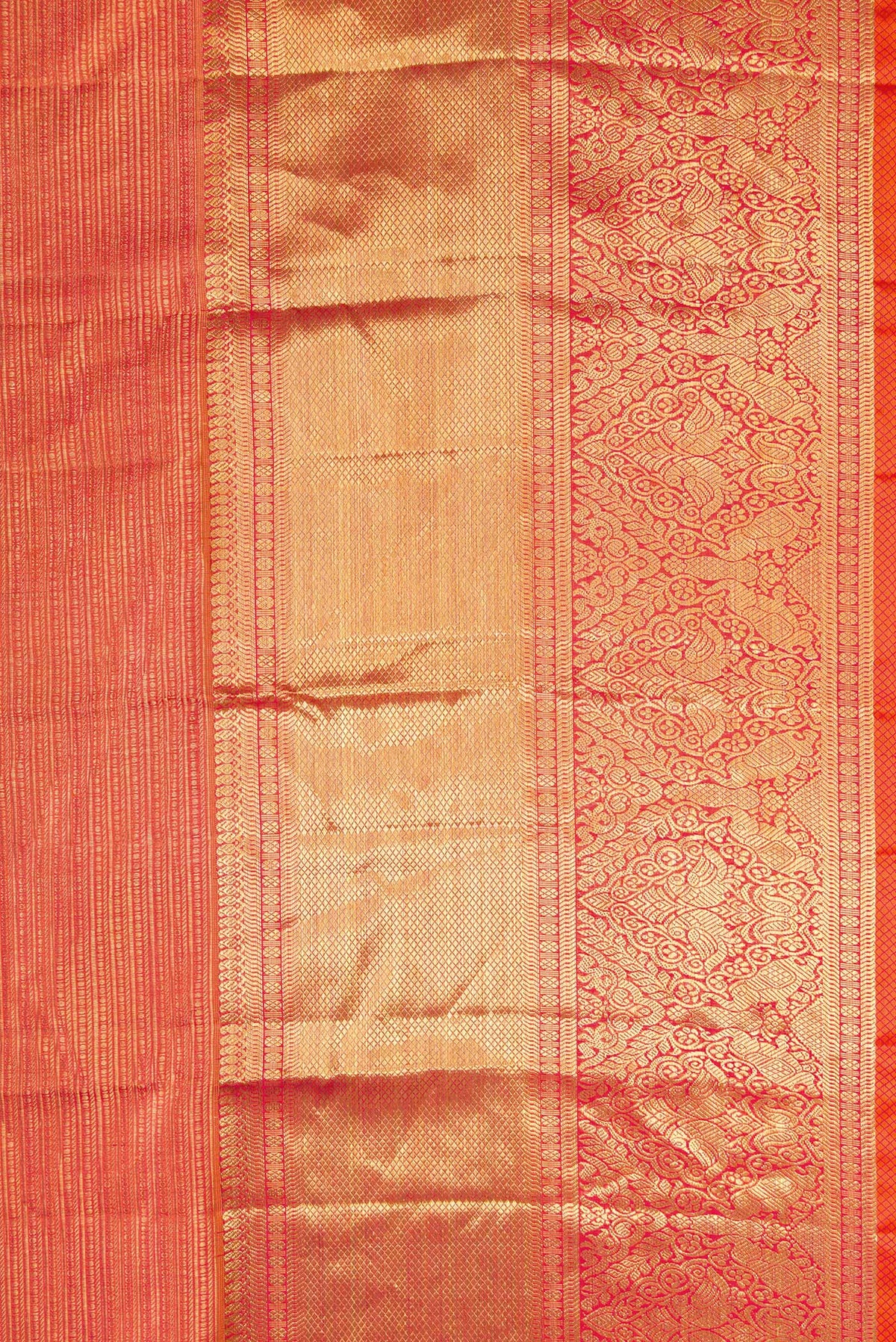 Close up image of the blouse of Brown Banarasi Raw Silk Saree with Zari Butta on the body and Zari Border. 