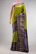 Off White Banarasi Georgette Saree with Zari Brocade on the body and Zari Border.  displayed on a mannequin