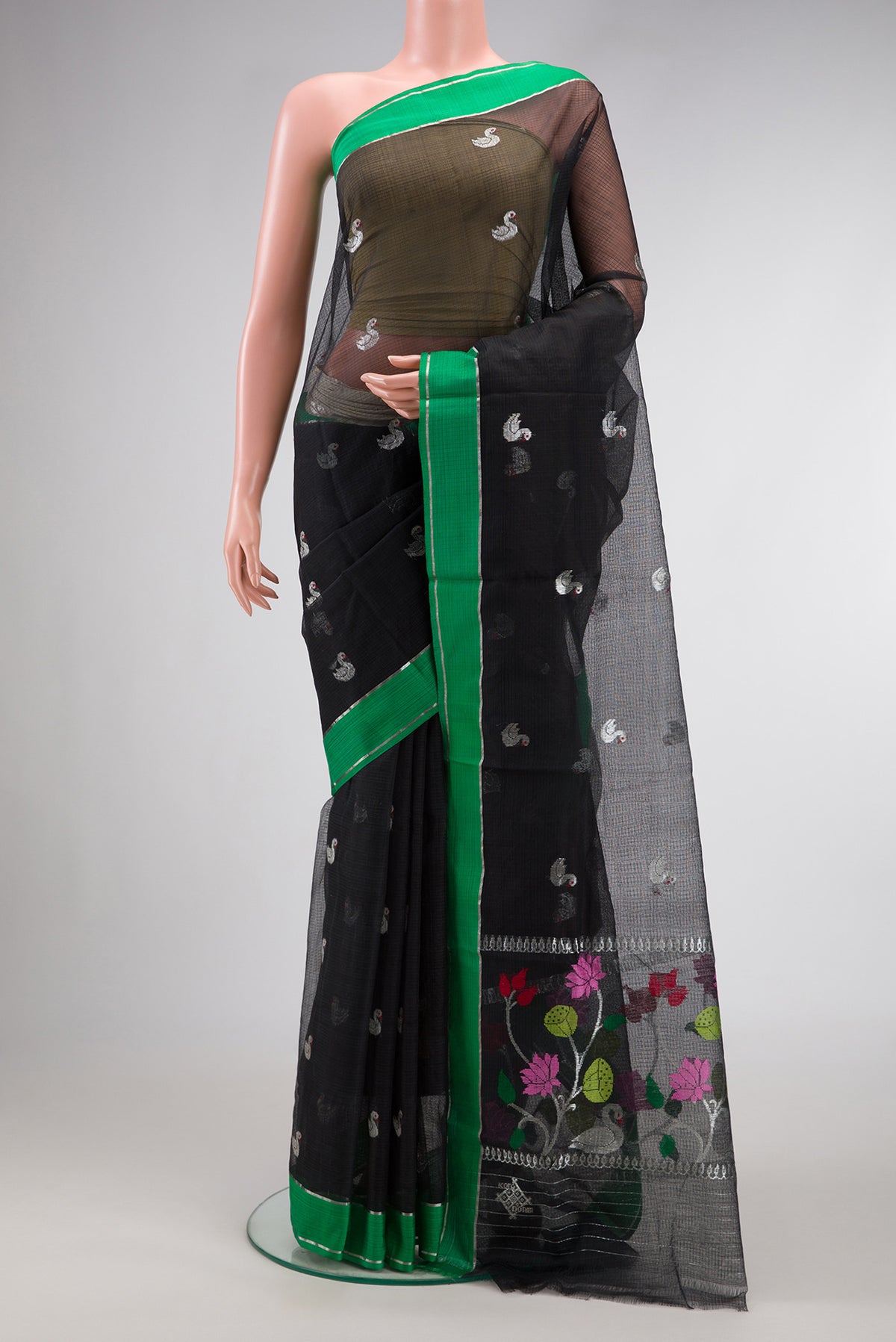 Maroon Kanchipuram Silk Saree with Checked design on the body and Zari Border.  displayed on a mannequin
