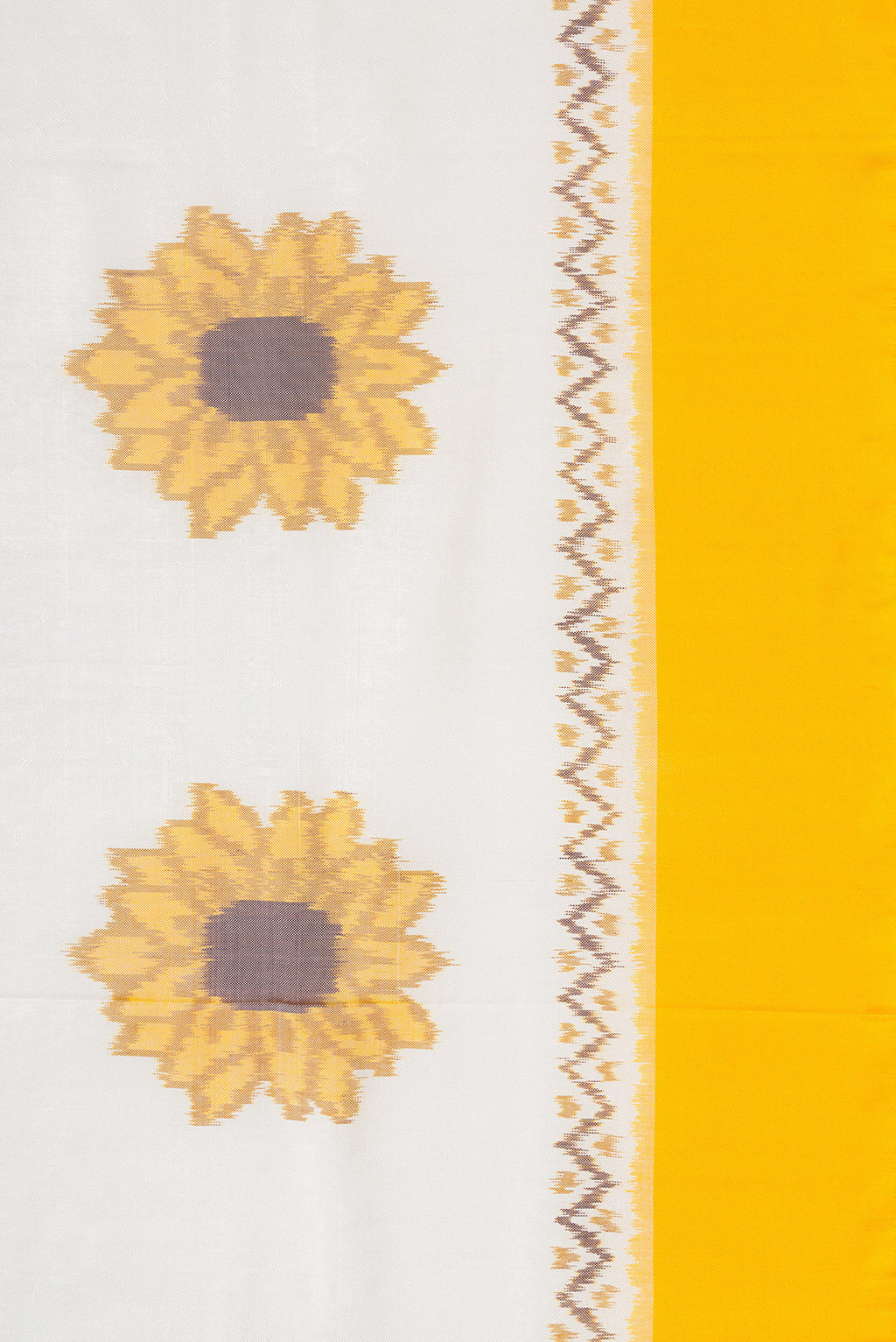 Close up image of the blouse of Beige Kanchipuram Silk Saree with Zari Butta on the body and Zari Border. 