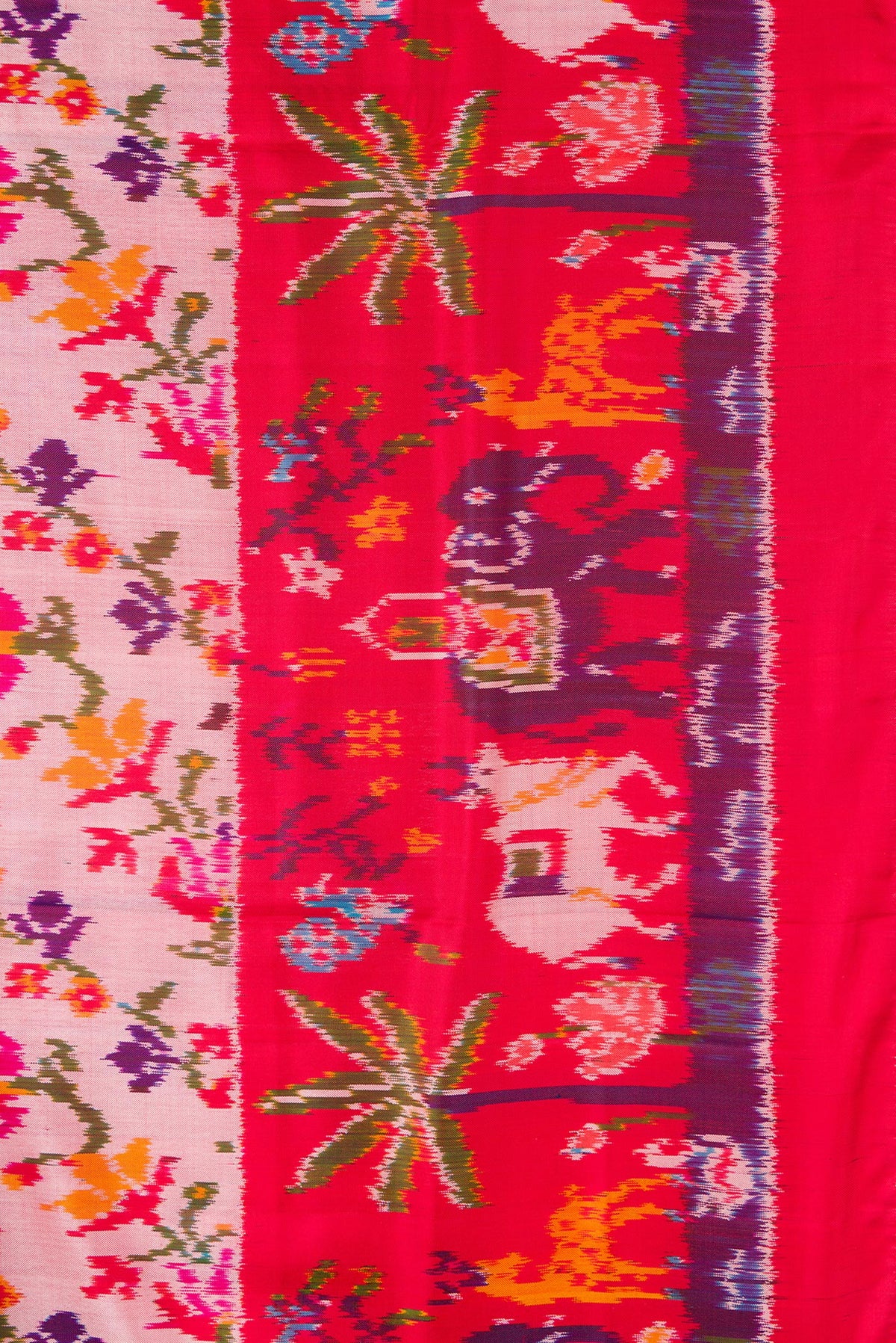 Close up image of the blouse of White Banarasi Silk Saree with Zari Butta on the body and Satin Border. 