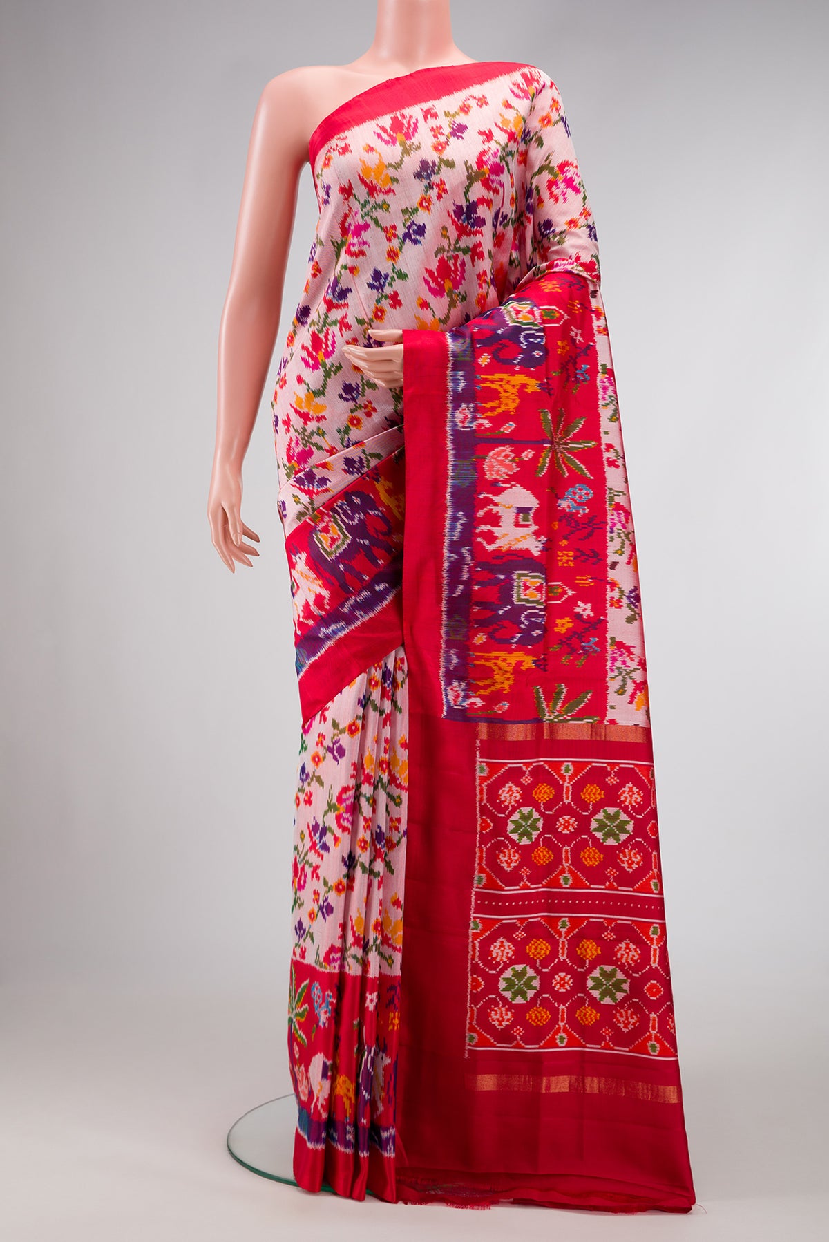 Pista Green Mysore Crepe Saree with Zari Brocade on the body and Zari Border.  displayed on a mannequin