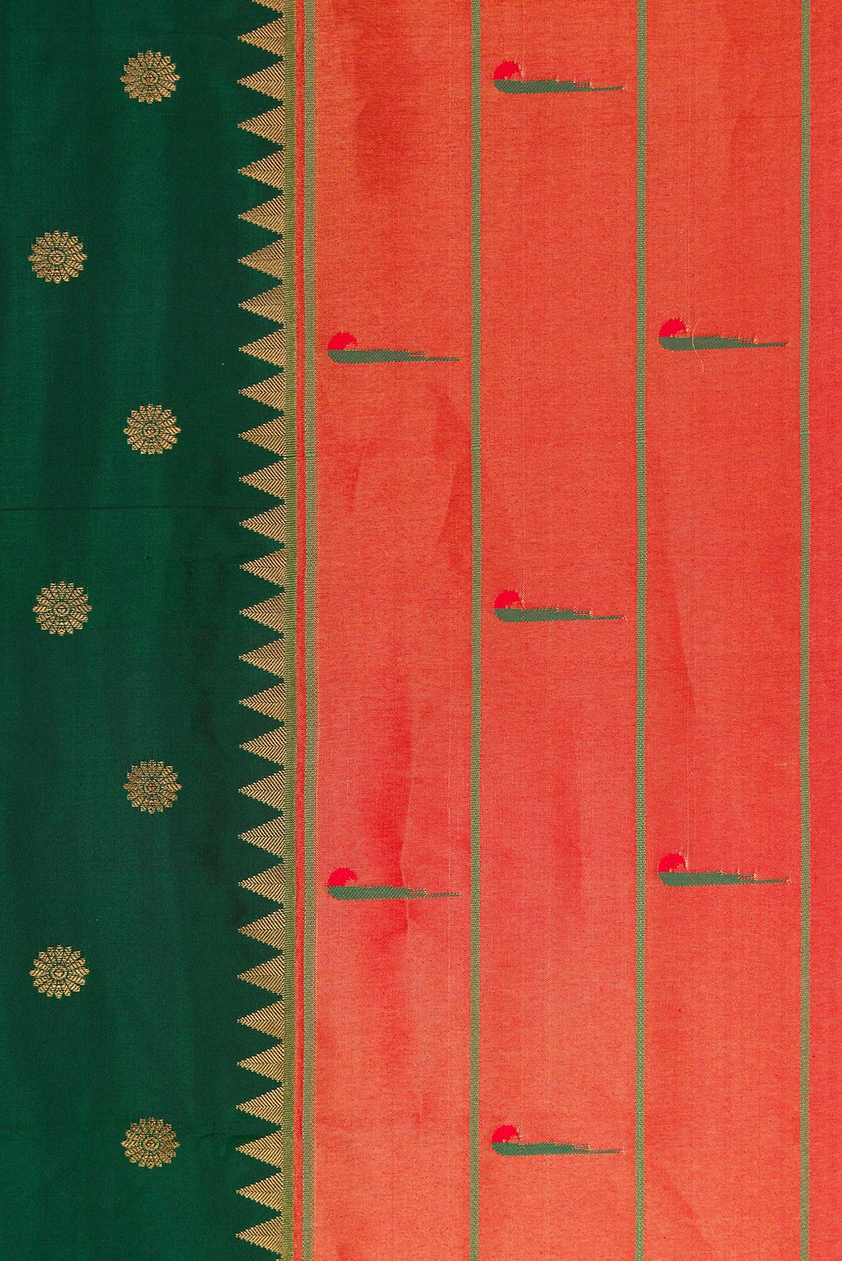 Close up image of the blouse of Yellow Kanchipuram Silk Saree with Zari Butta on the body and Zari Border. 
