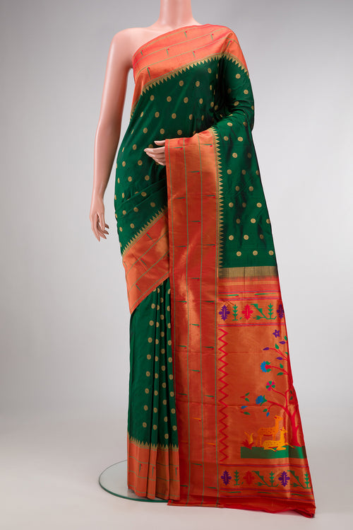 Black Mysore Crepe Saree with Zari Butta on the body and Fancy Border.  displayed on a mannequin