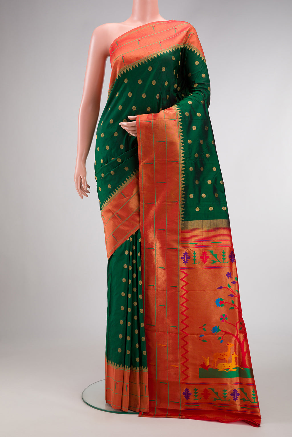 Brown Tussar Silk Saree with Printed design on the body and Thin Zari Line.  displayed on a mannequin