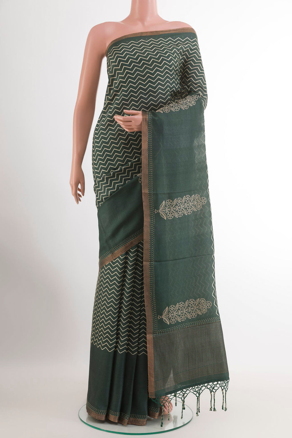 Blue Mysore Chiffon Saree with Printed design on the body and Plain Border.  displayed on a mannequin