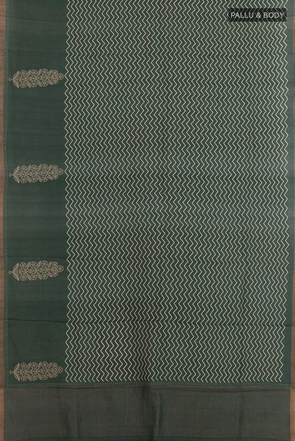 Pleats and pallu of Mustard Soft Silk Saree with Ikat design on the body and Zari Border. 