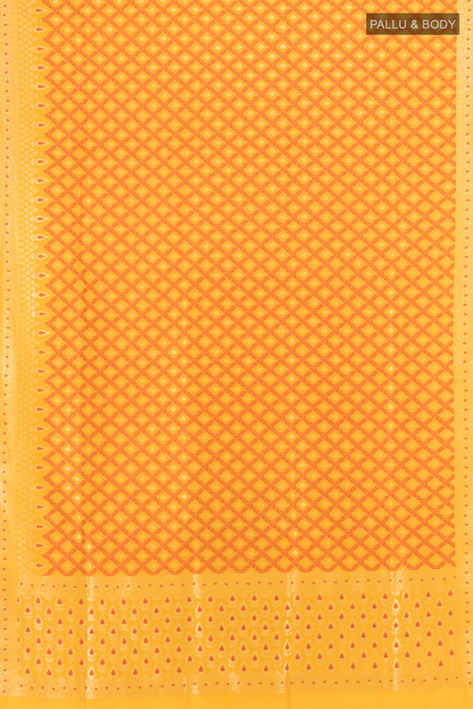 Pleats and pallu of Yellow with Pink Color Kanchipuram Silk Saree with Zari Butta on the body and Zari Border. 