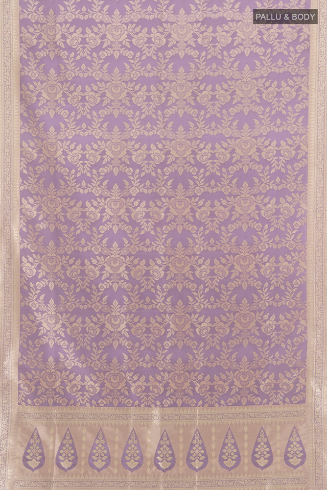 Pleats and pallu of Black Soft Silk Saree with Zari Butta on the body and Zari Border. 