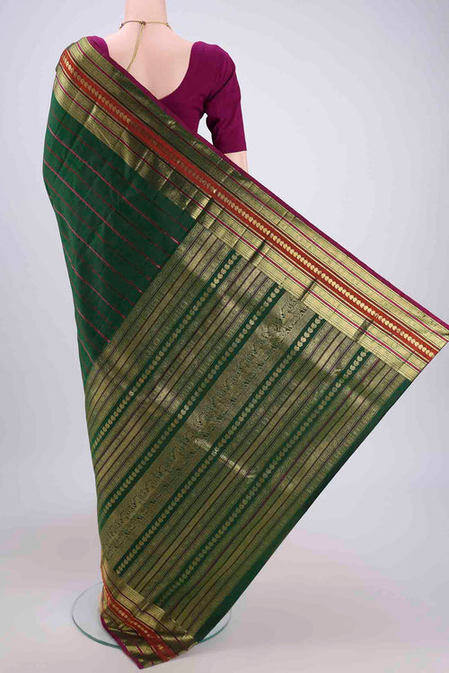 Pleats and pallu of Beige Kanjivaram Silk Saree with Checked design on the body and Zari Border. 