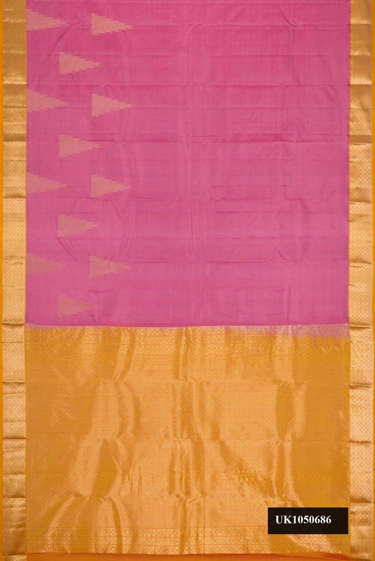 Pink Dual Tone Kanchipuram Silk Saree with Plain Body and Temple Border.  displayed on a mannequin