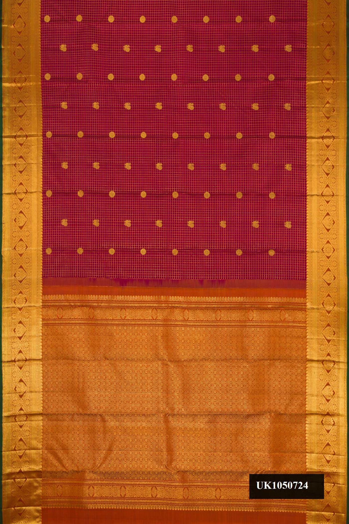Maroon Dual Tone Kanchipuram Silk Saree with Checked design on the body and Zari Border.  displayed on a mannequin