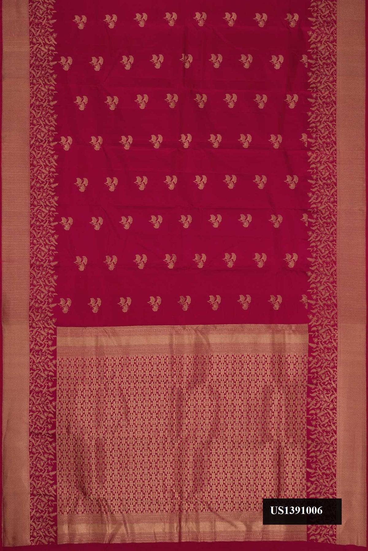 Maroon Dual Tone Kanchipuram Silk Saree with Zari Butta on the body and Zari Border.  displayed on a mannequin
