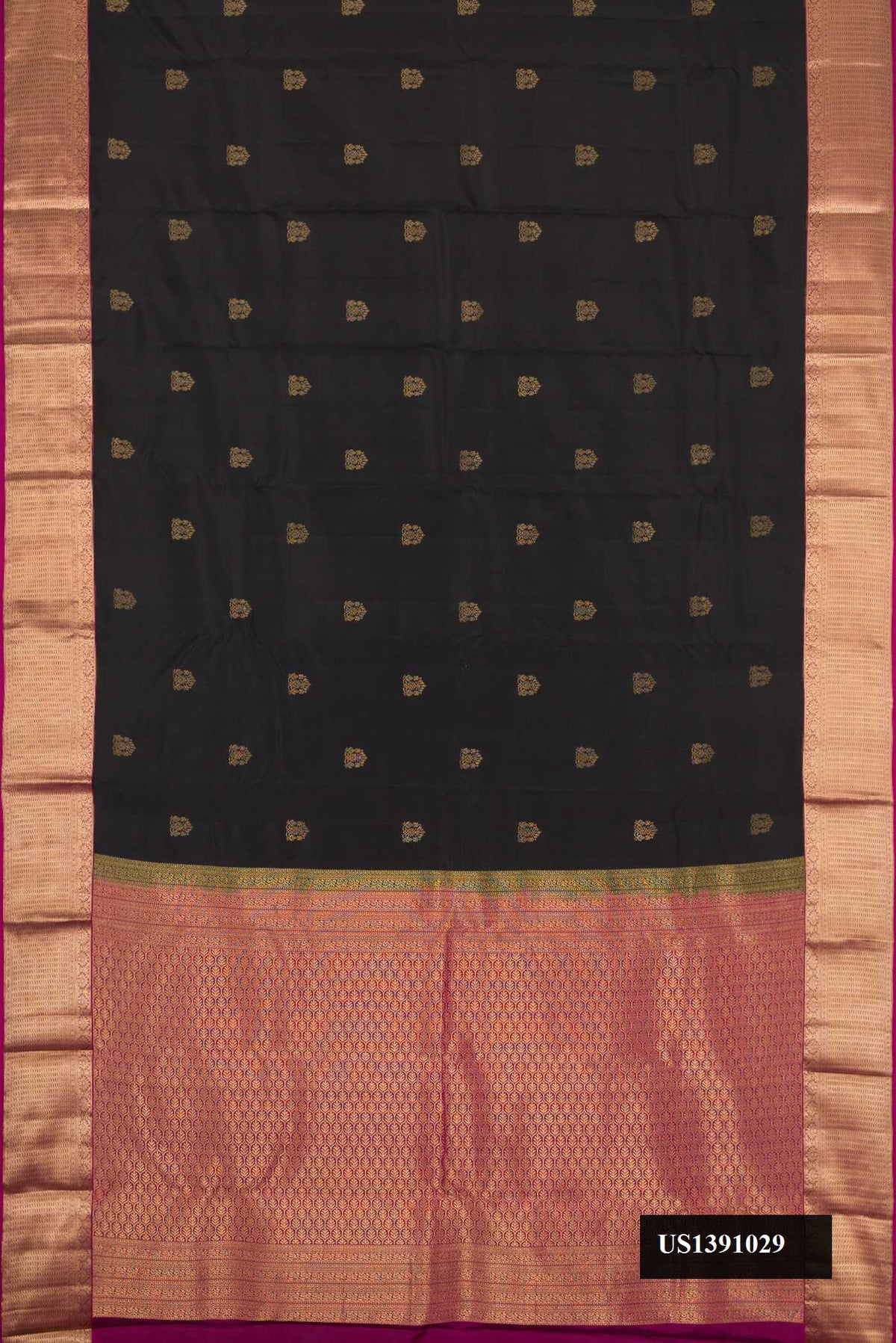 Black Dual Tone Kanchipuram Silk Saree with Zari Butta on the body and Zari Border.  displayed on a mannequin