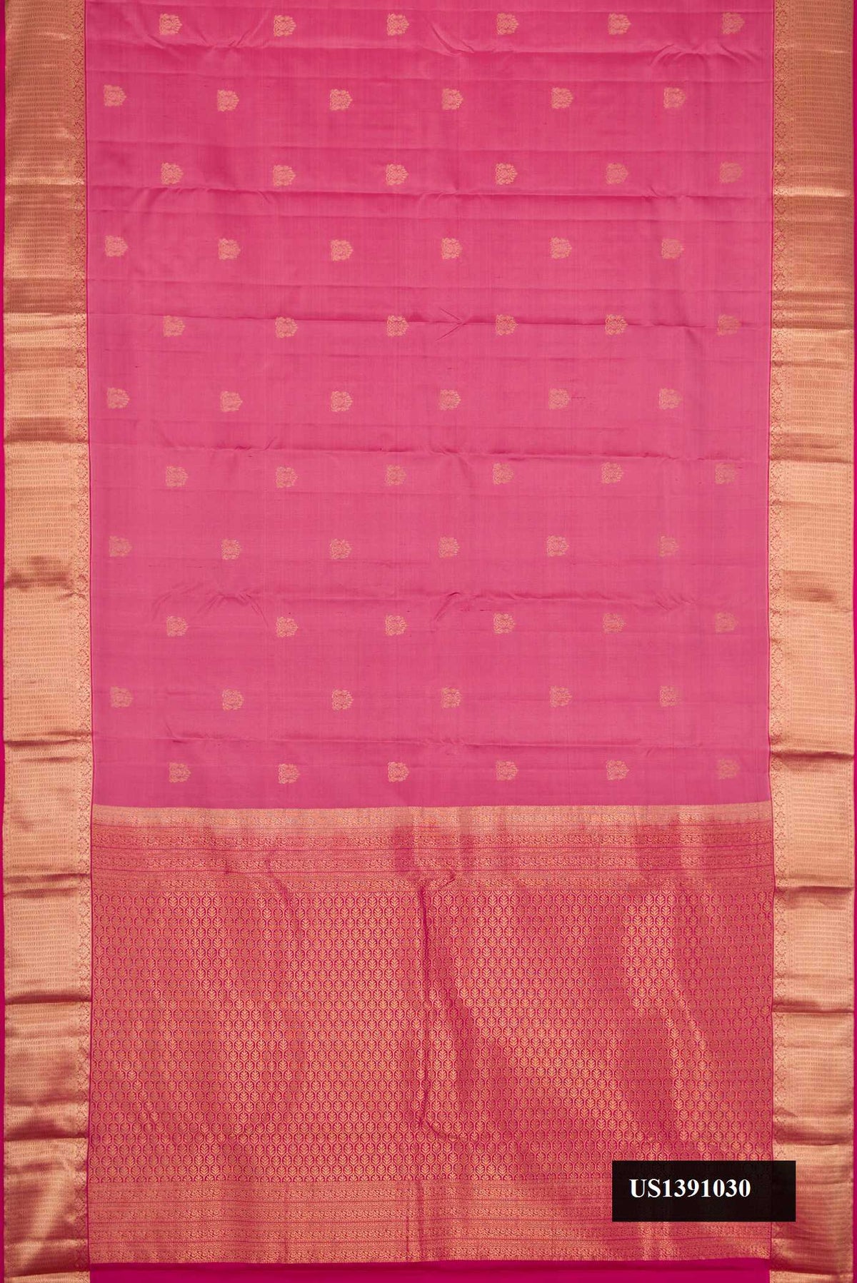Pink Dual Tone Kanchipuram Silk Saree with Zari Butta on the body and Fancy Border.  displayed on a mannequin