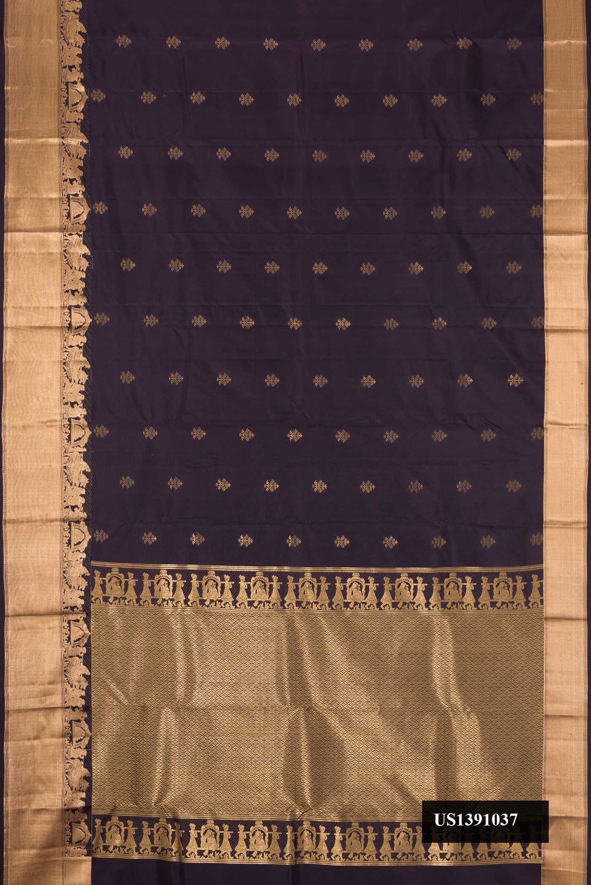 Navy Blue Dual Tone Kanchipuram Silk Saree with Zari Butta on the body and Zari Border.  displayed on a mannequin