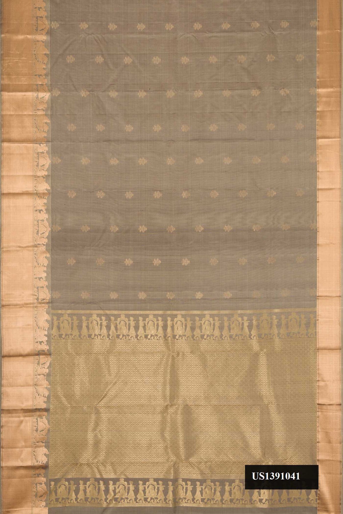 Grey Dual Tone Kanchipuram Silk Saree with Zari Butta on the body and Zari Border.  displayed on a mannequin