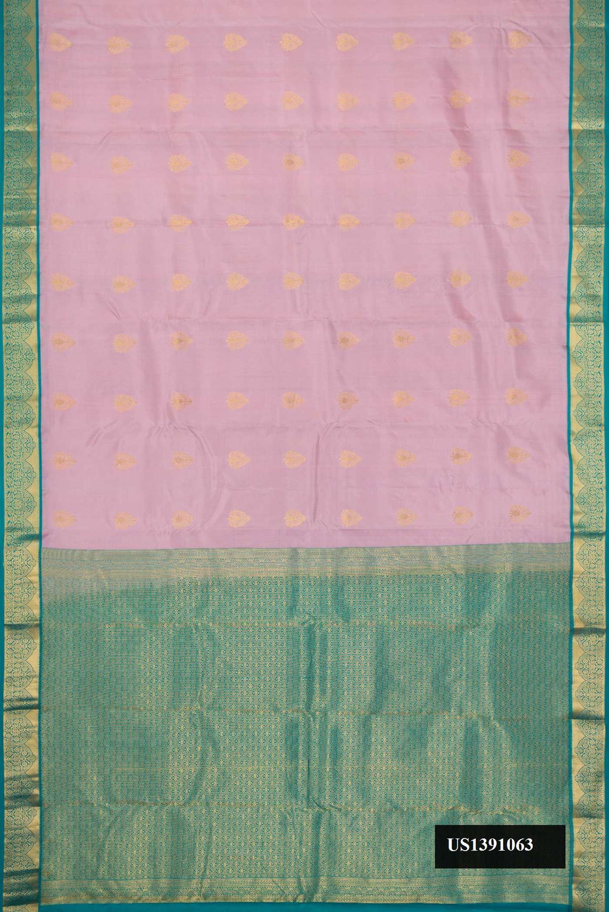 Lavender Dual Tone Kanchipuram Silk Saree with Zari Butta on the body and Zari Border.  displayed on a mannequin