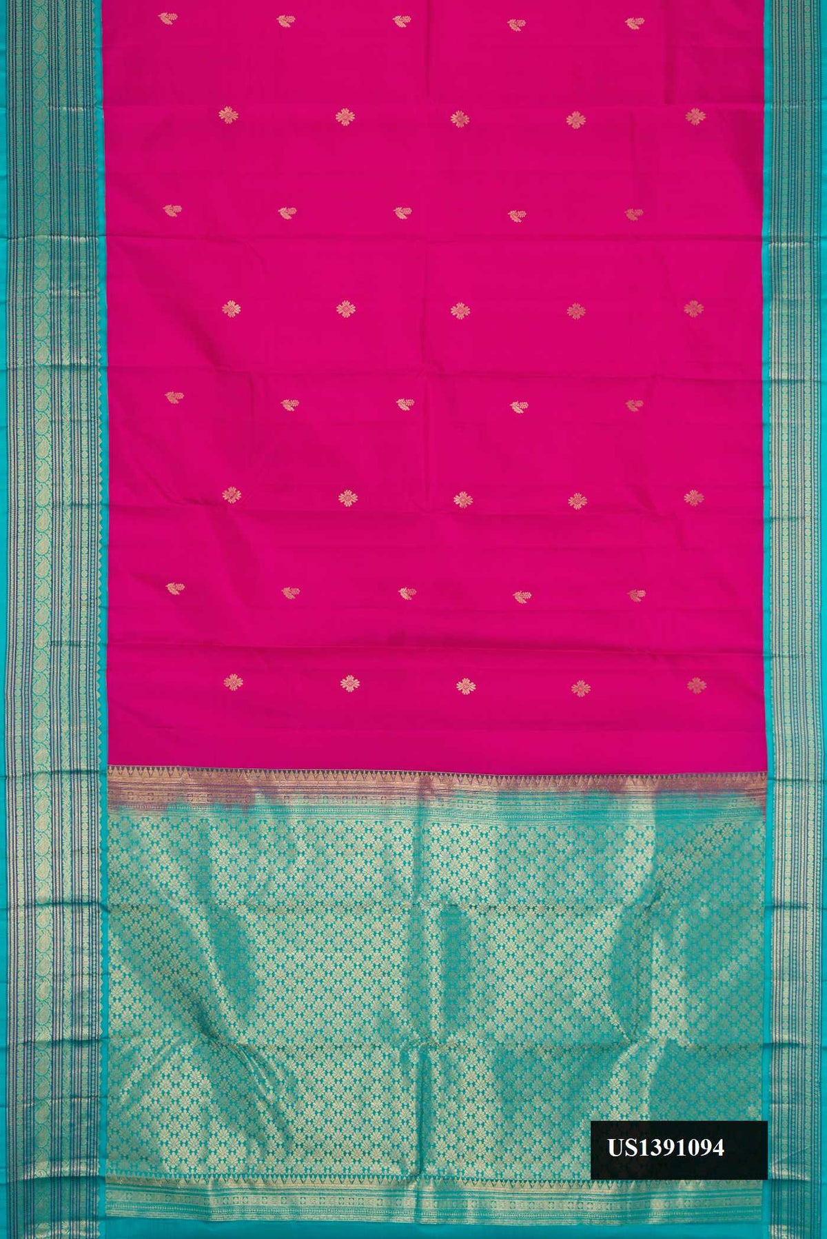 Magenta Dual Tone Kanchipuram Silk Saree with Zari Butta on the body and Zari Border.  displayed on a mannequin
