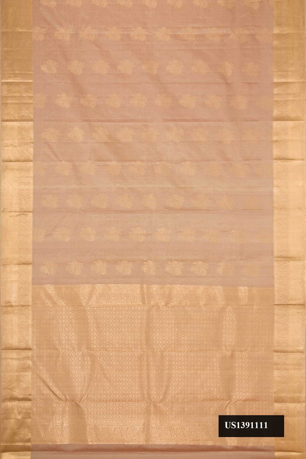 Beige Dual Tone Kanchipuram Silk Saree with Zari Butta on the body and Zari Border.  displayed on a mannequin