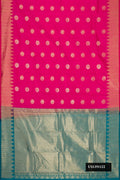 Rani Pink Dual Tone Kanchipuram Silk Saree with Zari Butta on the body and Zari Border.  displayed on a mannequin