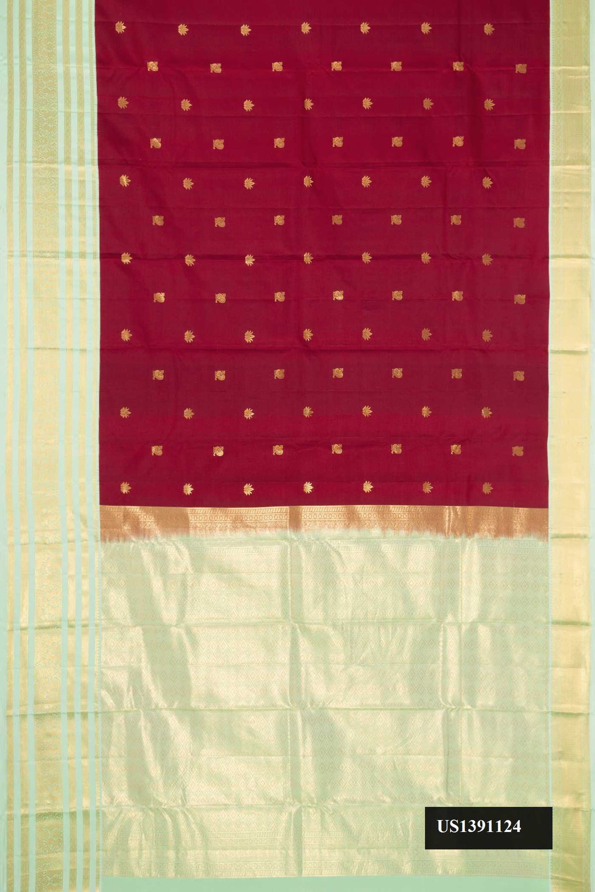 Maroon Dual Tone Kanchipuram Silk Saree with Zari Butta on the body and Zari Border.  displayed on a mannequin