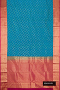 Peacock Blue Dual Tone Kanchipuram Silk Saree with Zari Brocade on the body and Zari Border.  displayed on a mannequin