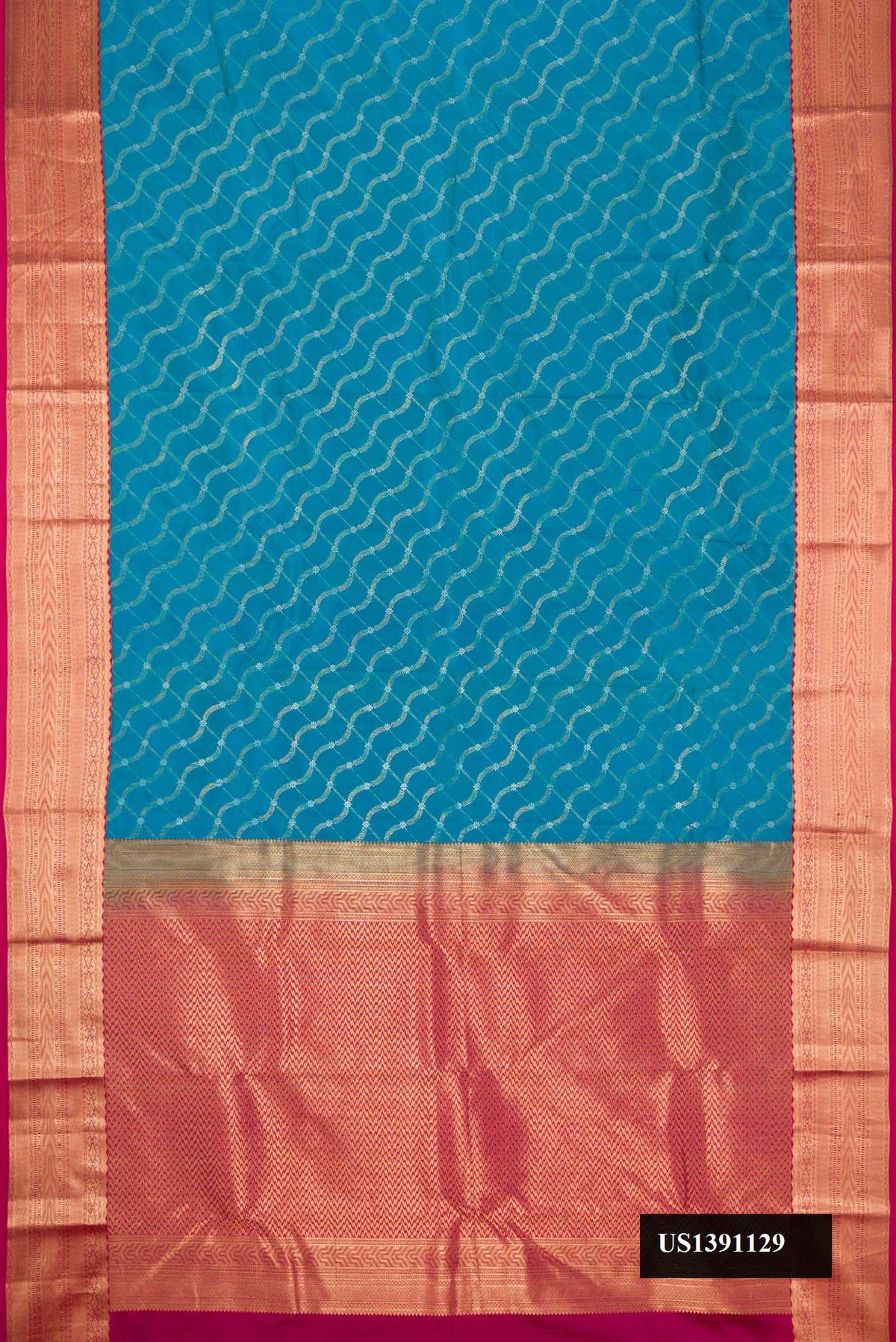 Peacock Blue Dual Tone Kanchipuram Silk Saree with Zari Brocade on the body and Zari Border.  displayed on a mannequin