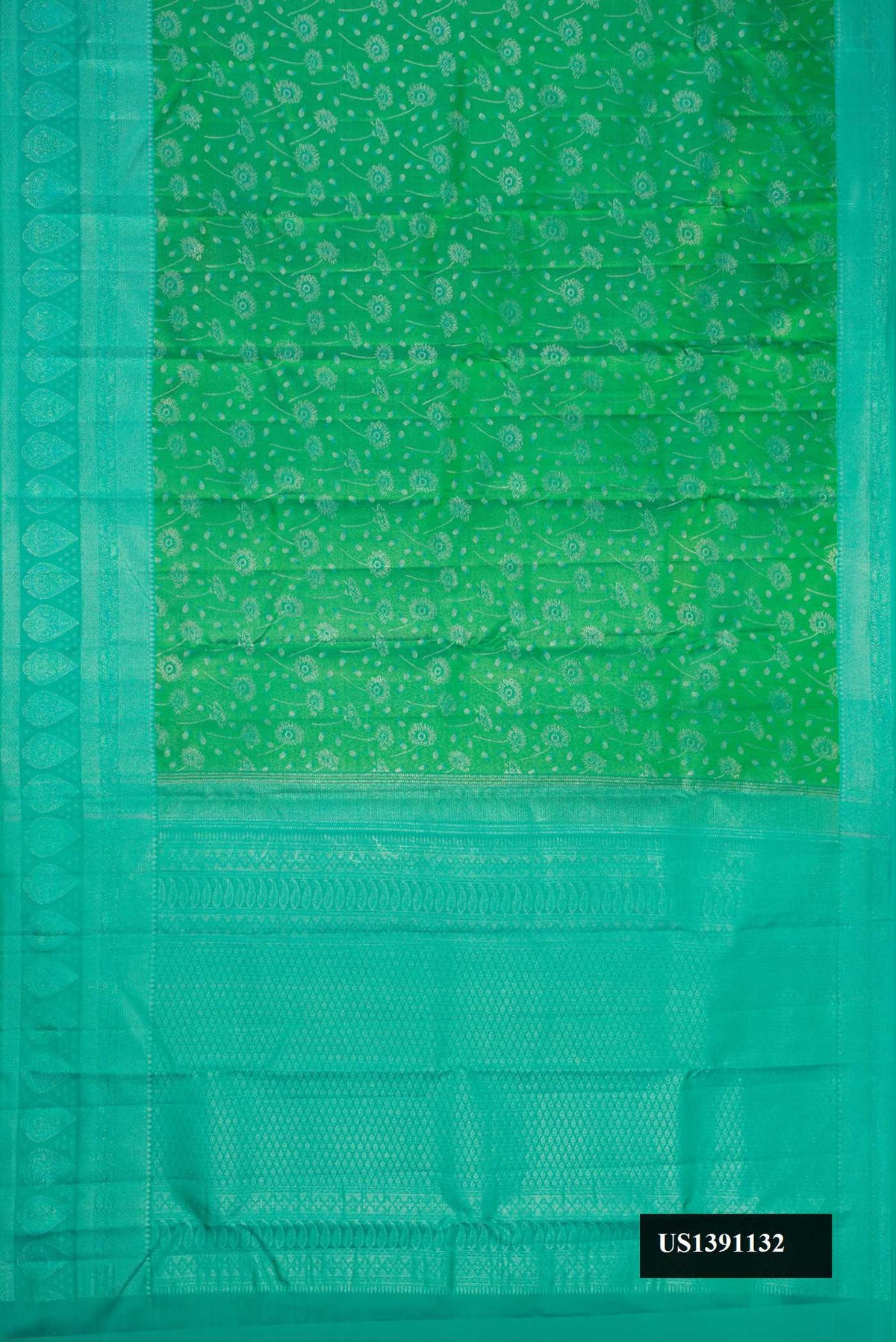 Green Dual Tone Kanchipuram Silk Saree with Zari Brocade on the body and Fancy Border.  displayed on a mannequin