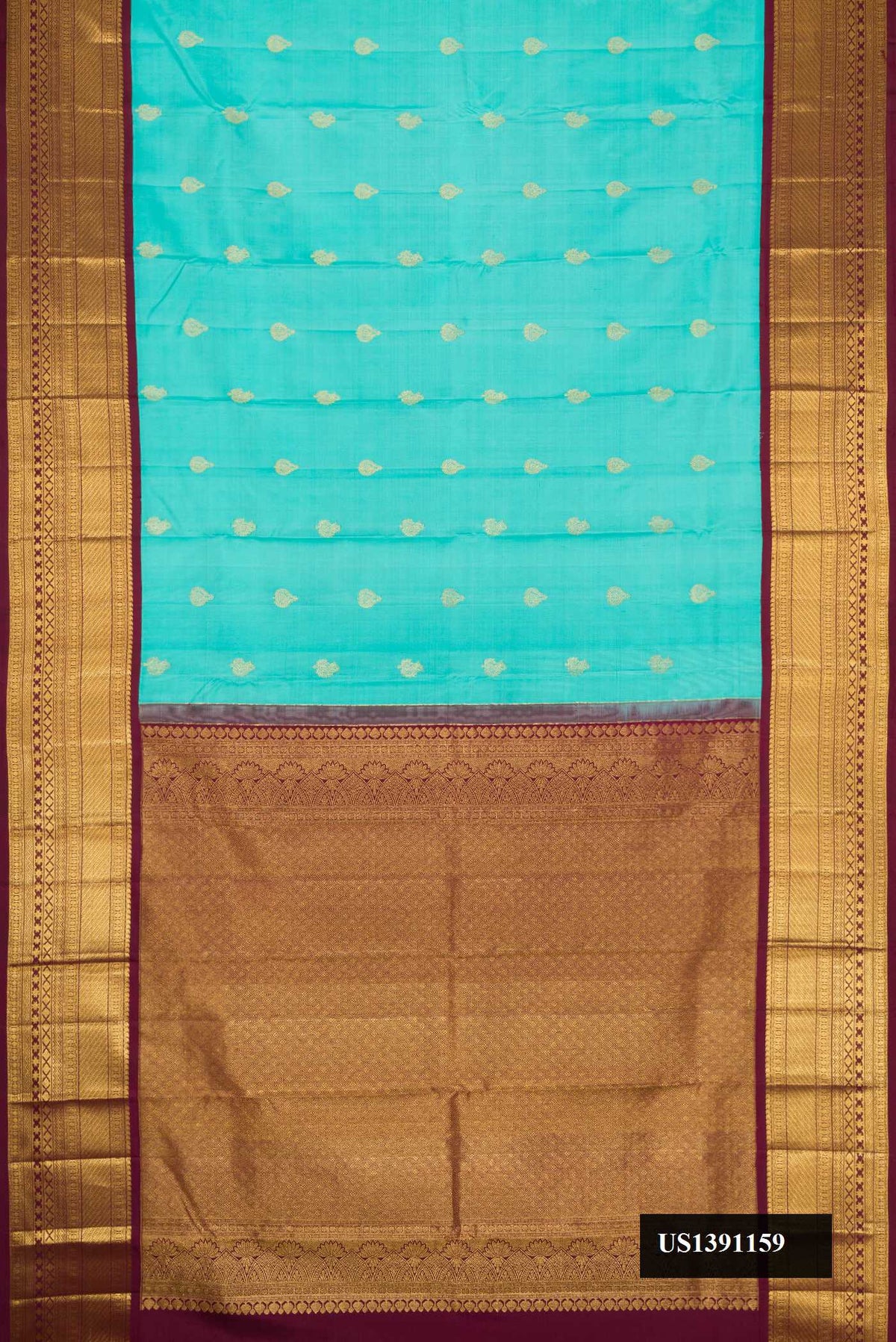 Sky Blue Dual Tone Kanchipuram Silk Saree with Zari Butta on the body and Zari Border.  displayed on a mannequin