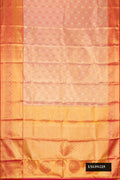 Gold Dual Tone Kanchipuram Tissue Silk Saree with Zari Brocade on the body and Zari Border.  displayed on a mannequin