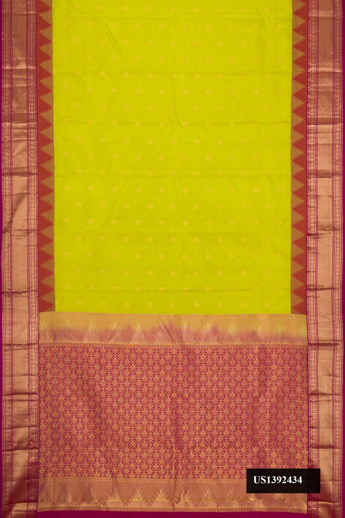 Parrot Green Dual Tone Kanchipuram Silk Saree with Zari Butta on the body and Zari Border.  displayed on a mannequin