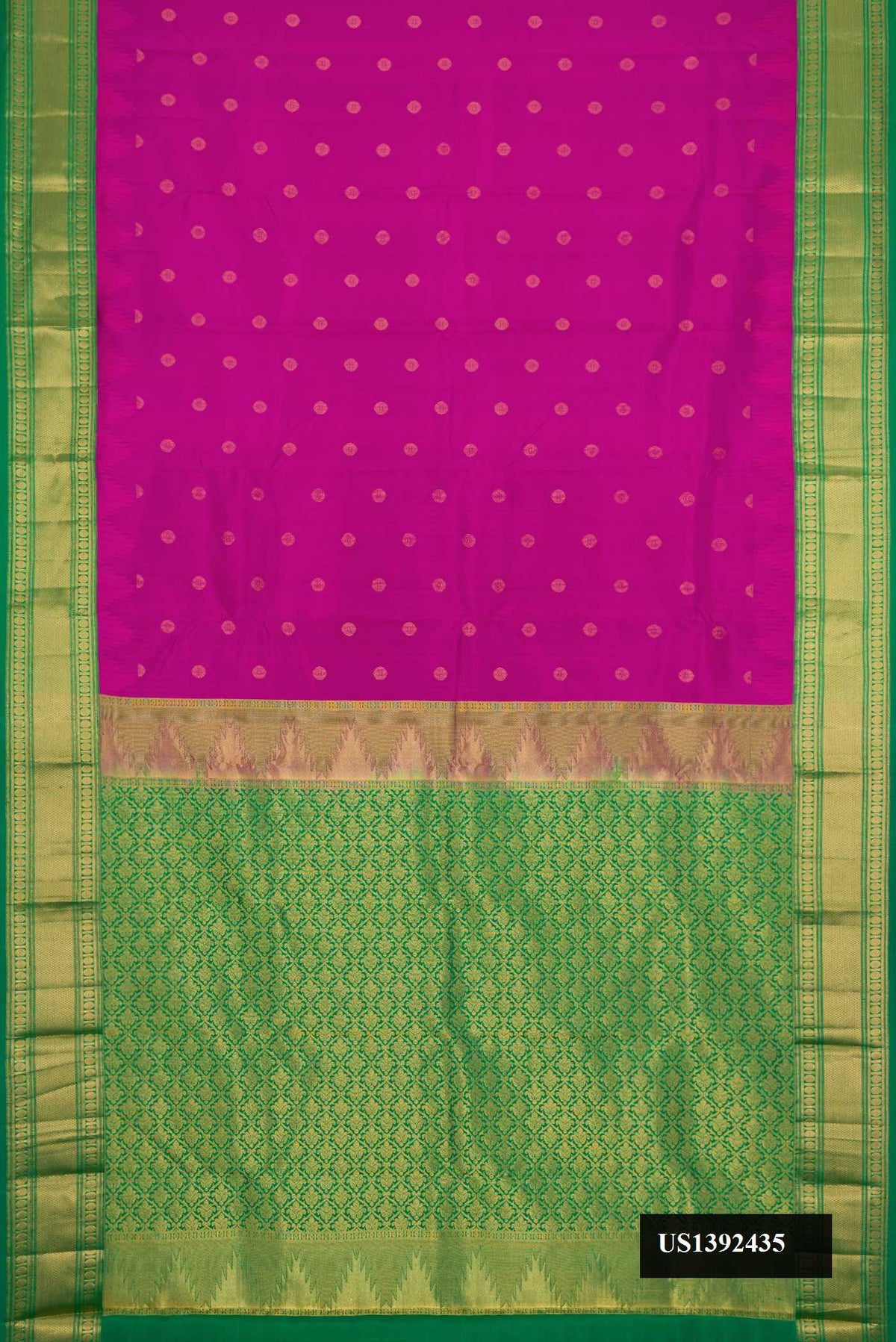 Magenta Dual Tone Kanchipuram Silk Saree with Zari Butta on the body and Zari Border.  displayed on a mannequin
